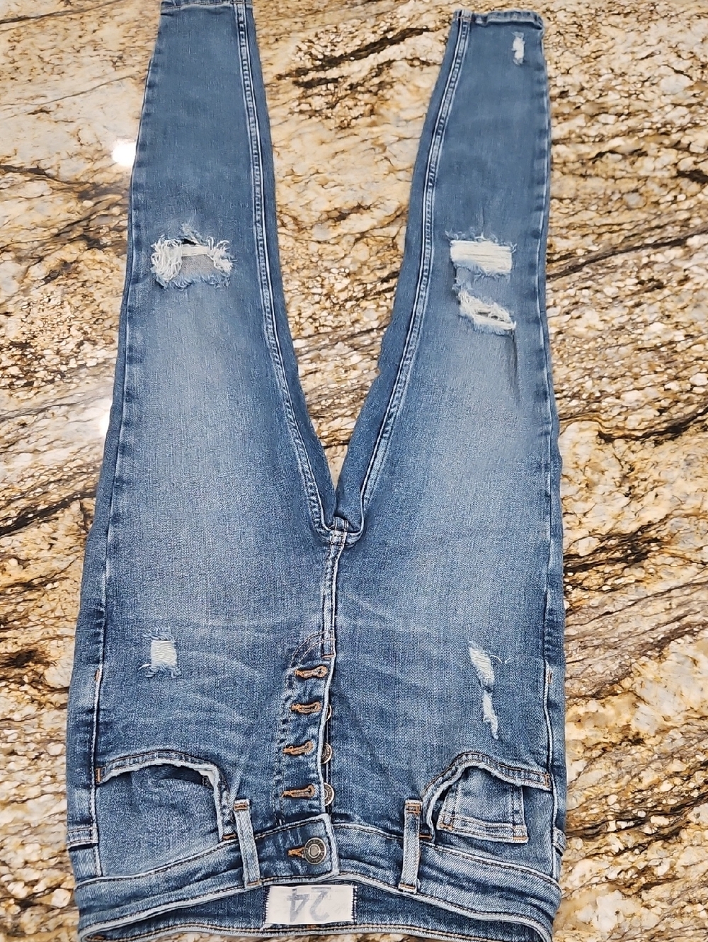 WE THE FREE Women’s  Distressed Button-Fly Jeans. Size 24 Inseam 27" Rise 8.5"